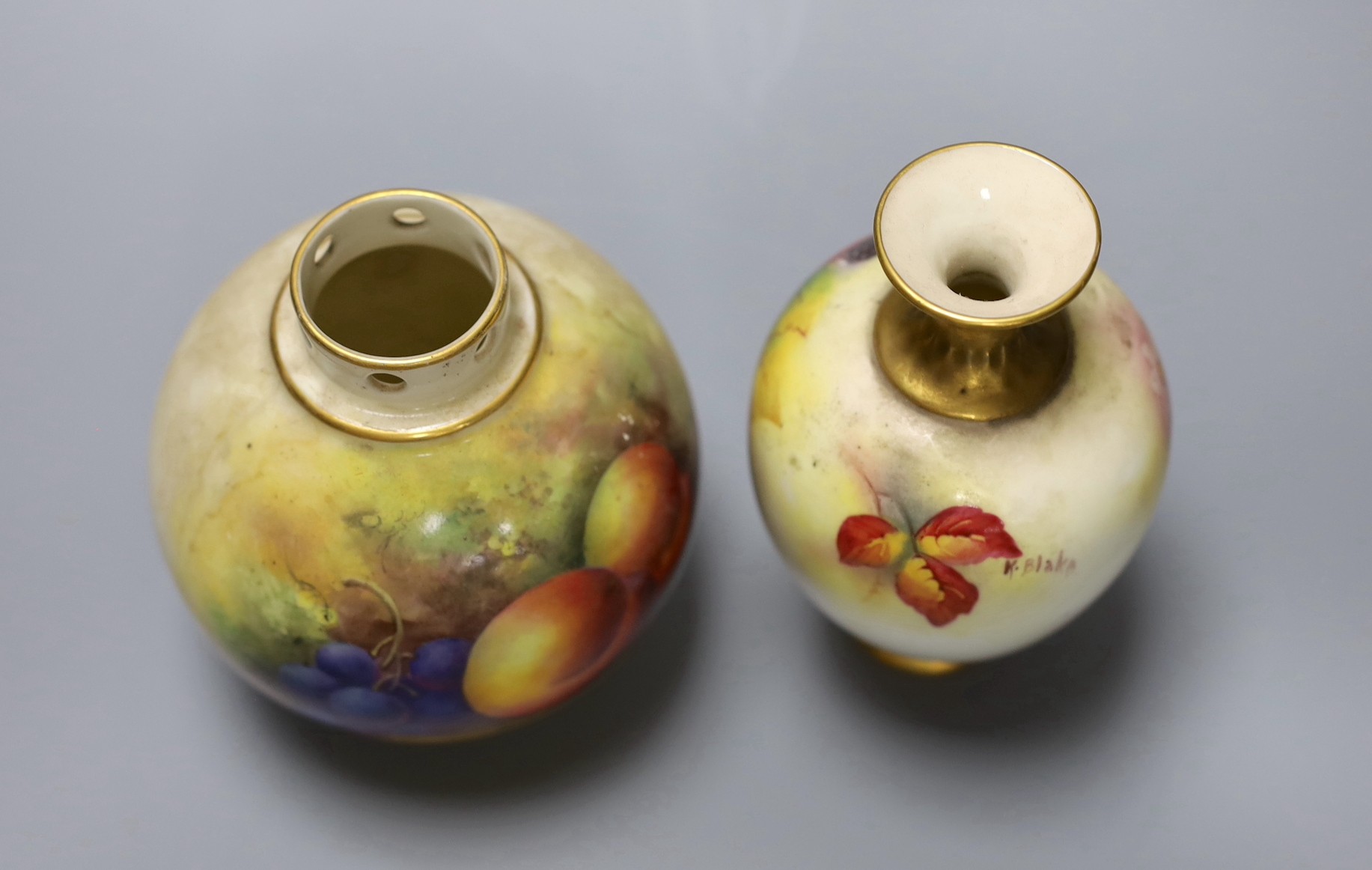 Two hand painted Royal Worcester vases, the taller signed K.Blake, the other signed H.Price, tallest 13cm